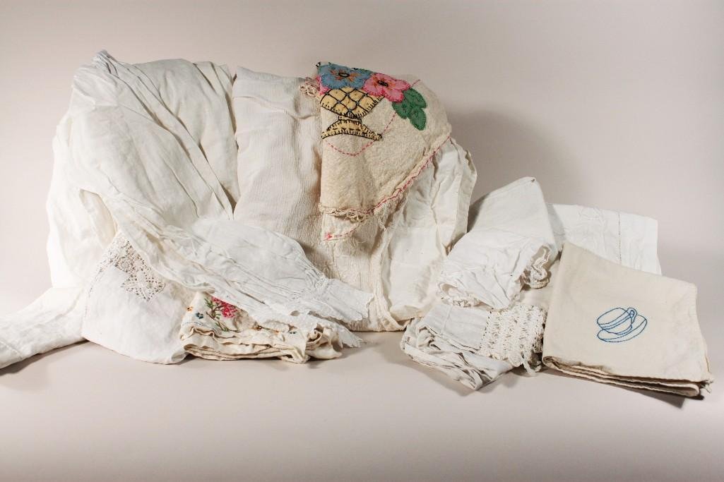 Vintage Linens: Lot include a night gown, embroidered petticoat, embroidered table cloth, doily, and more 
