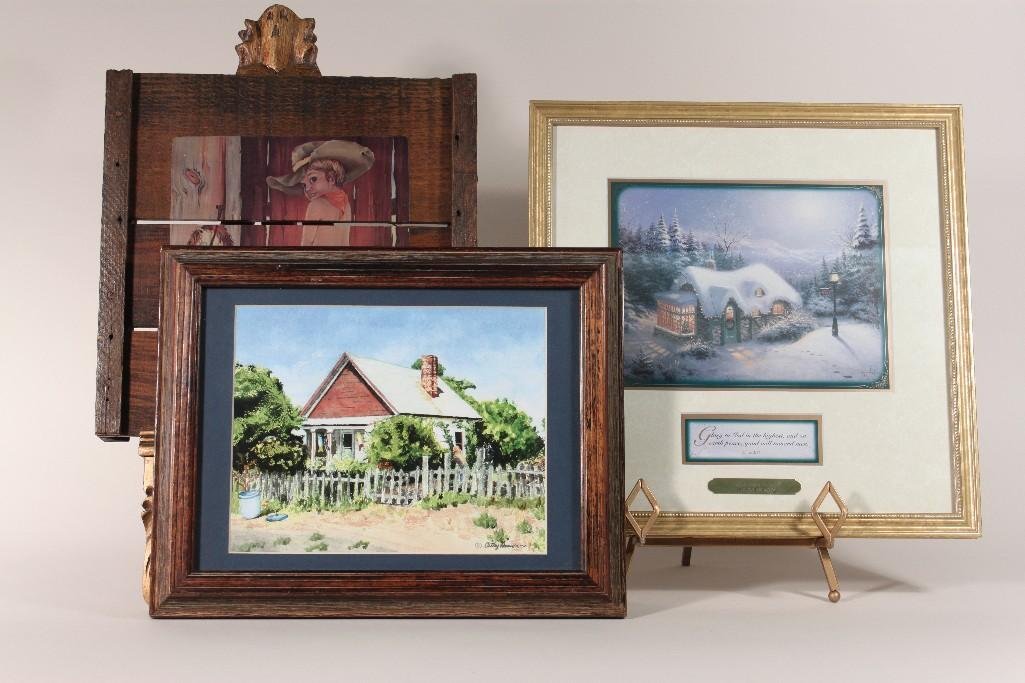 Thomas Kincade Print & other Art Work: Thomas Kincade print is title "Peace On Earth", House scene print signed Cathy Hansen, and a G. Ranck Print on wood 