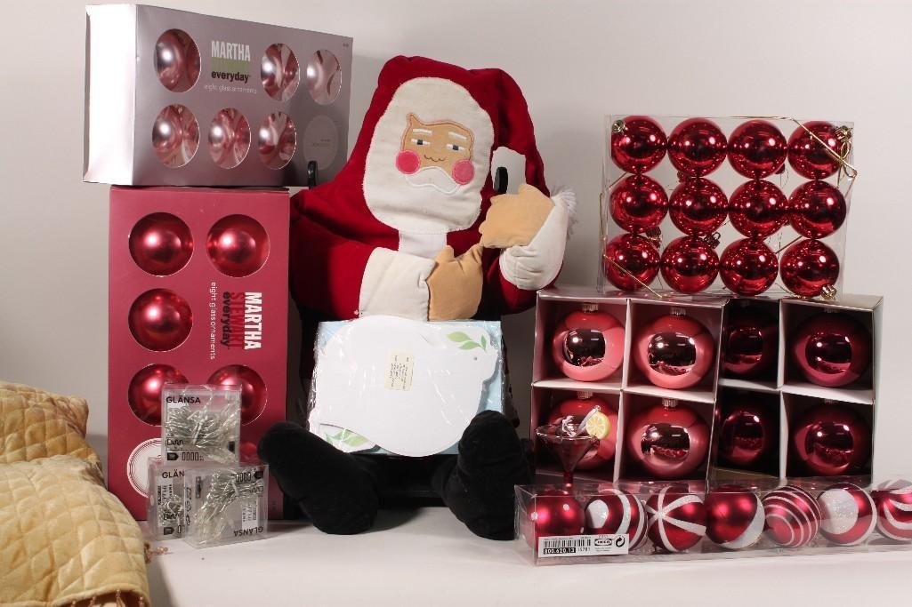 Christmas Decor: Lot includes Christmas dish towells, plush santa, Christmas cards, shatter proof ornaments, glass ornaments, gold beaded tree skirt, and more 