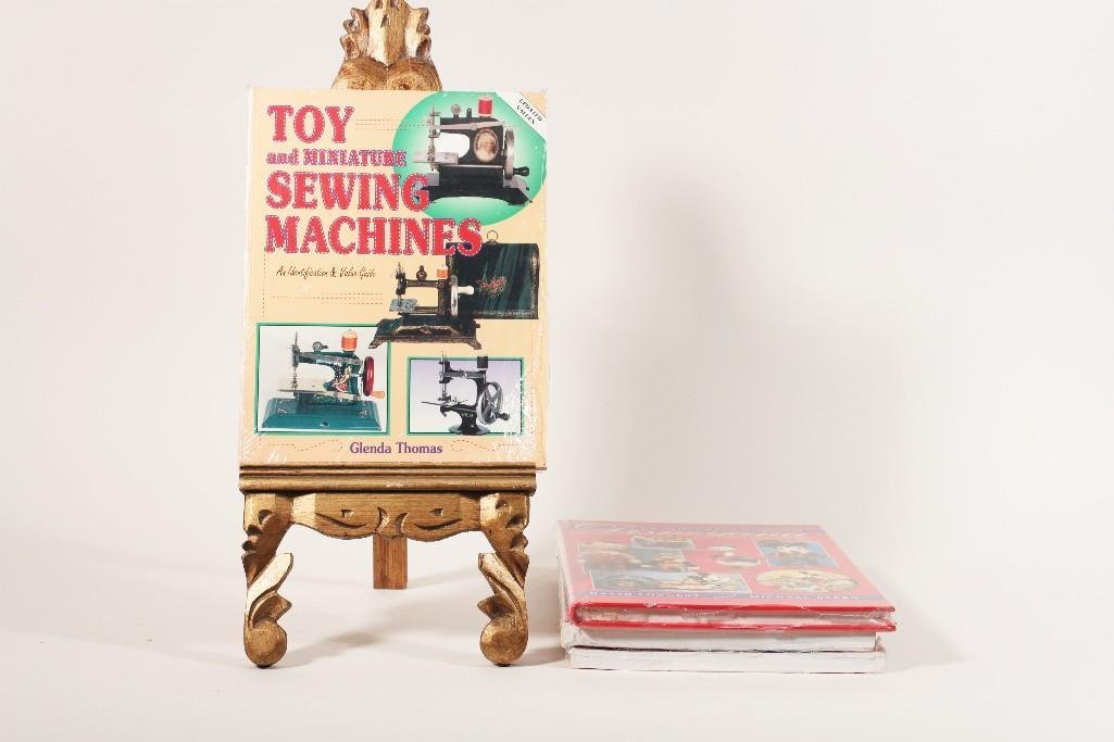 Reference Books (4): titles include: "Toy and Miniature Sewing Machines" book #1 and #2, "The Collectors Encyclopedia of Disney Ana", "Motorcycle Toys"
