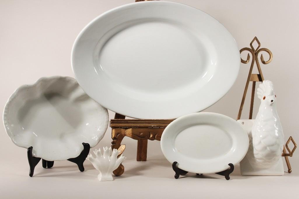 White Porcelain Kitchenware (5): Lot include 17" long oval platter marked iron stone China, Oval bowl marked Homer Laughlin 11 in. long, 8.5 in. oval plate, and a porcelain chicken wall hanging that is 9.5" tall