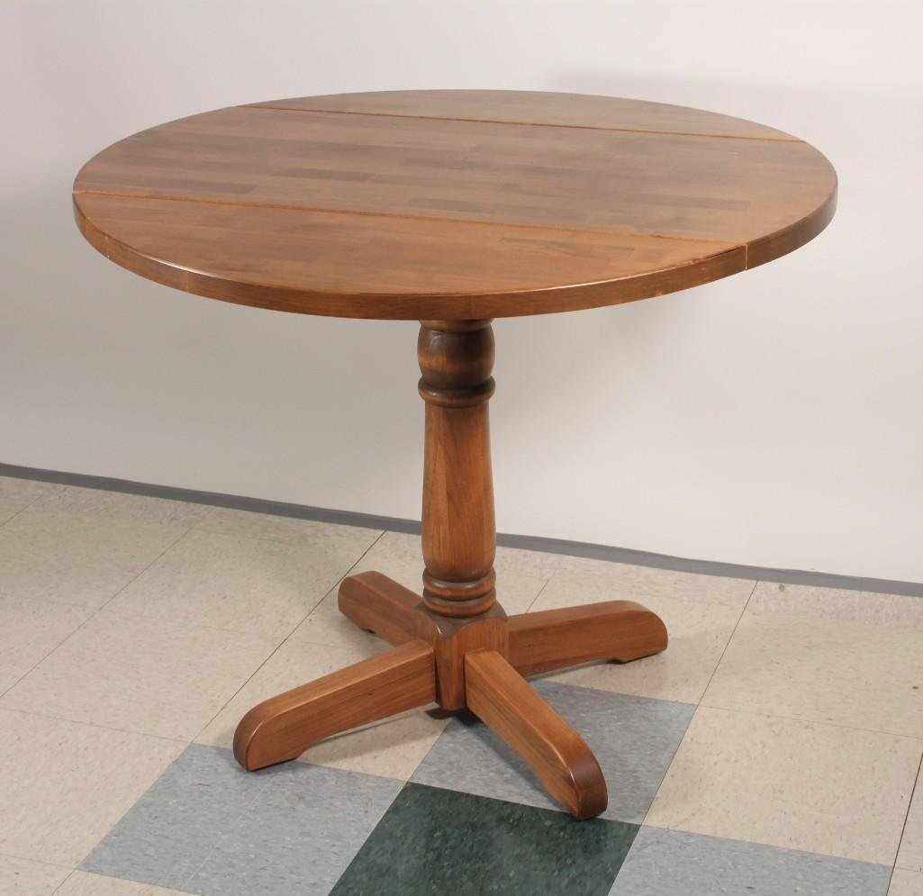 Drop Leaf Wood Table: Table has a 36" diameter, 29" tall, in great condition