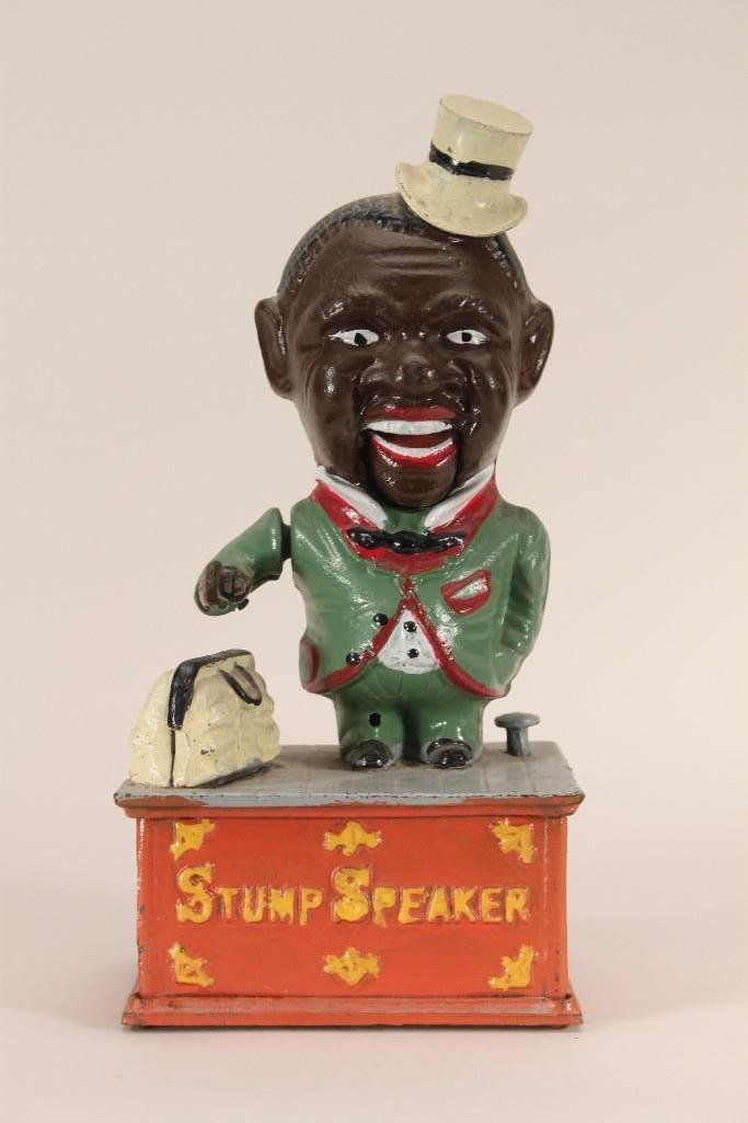 Vintage Iron Collectible Bank: reproduction mechanical bank, marked made in Taiwan, 10" tall stump speaker, shows some wear