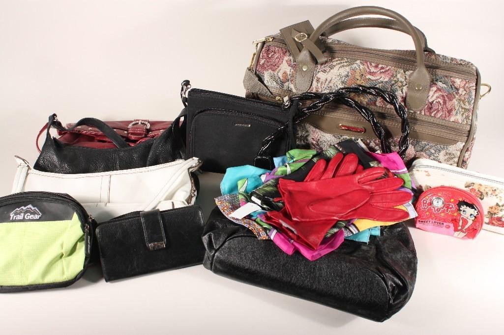 Ladies Purses and Wallets: Includes a Anna Sui wallet, Rosettie New york black purse, Wilsons Leather purse, a white leather purse, and more, all are in fair condition