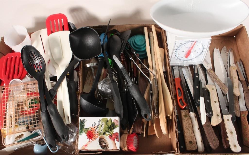 Kitchen Utensils: Lot includes a nice assortment of spatulas, The Ultimate Grater, Knives, and much more, 
