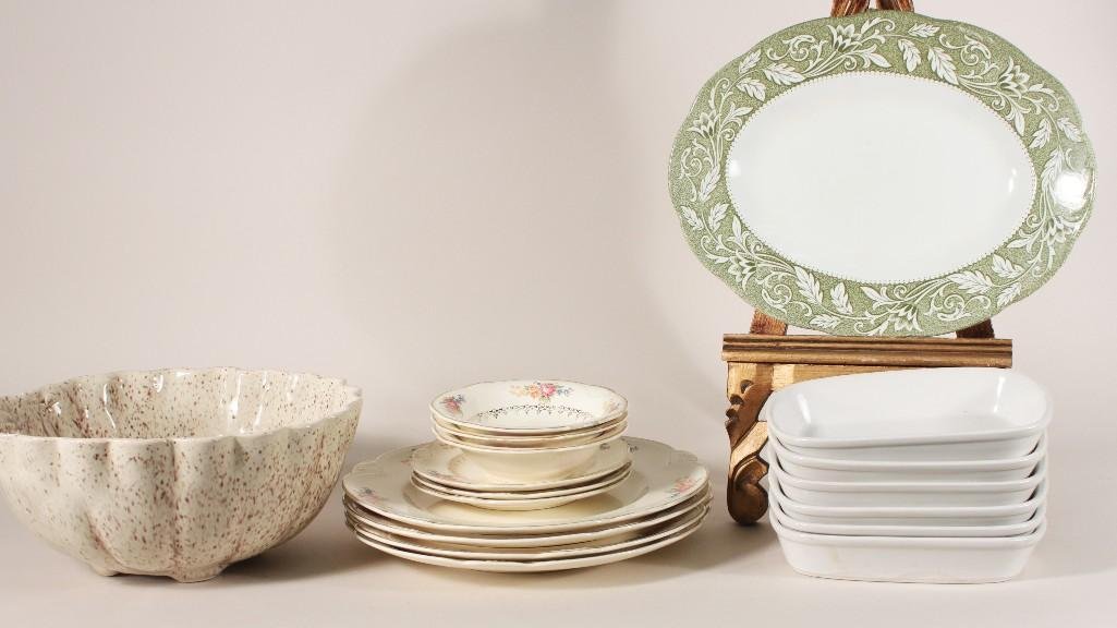 Dishware (18): items include: Homer Laughlin set with four dinner plates, three B&B plates, and three dessert bowls (some chips). Also includes an oval platter that is stamped English Ironstone Sterling, six sha