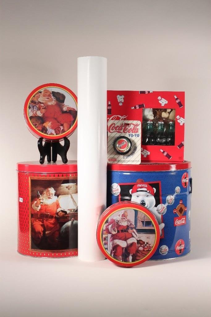 Coca-Cola Collectibles: (4) Empty tin cans, biggest one is 11.5" tall, yo-yo, coca-cola brand light set, and a 1995 poster 