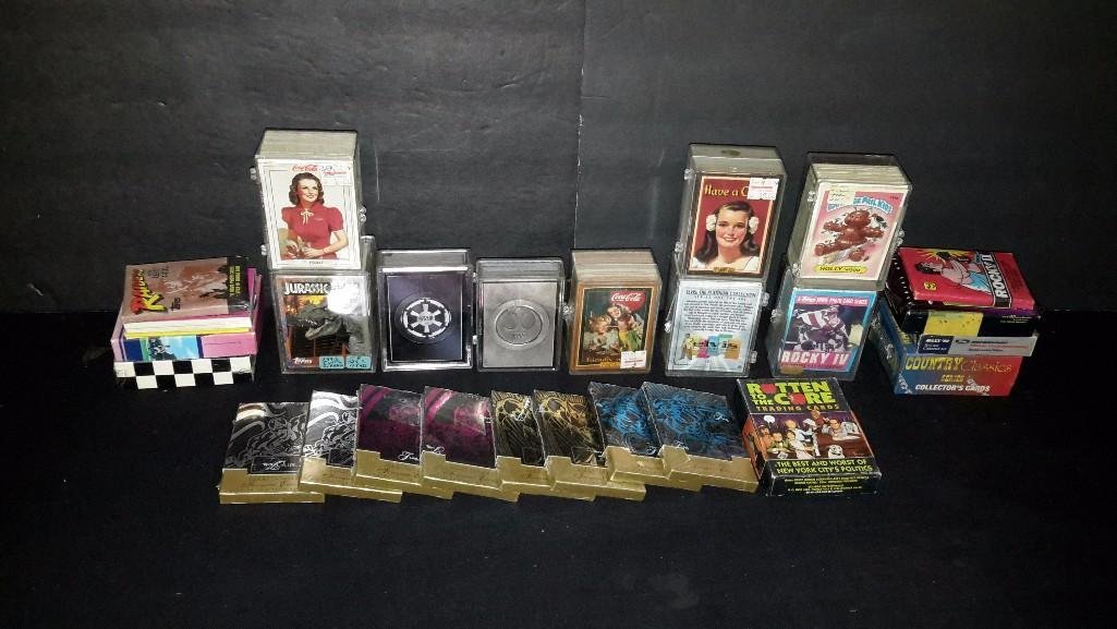 Vintage Trading Cards: Country Music, 1993 Topps Jurassic Park, Garbage Pail Kids, Coca-Cola, Elvis, Ford Motors, Petty Family Racing, Star Wars and much more, some new in carton