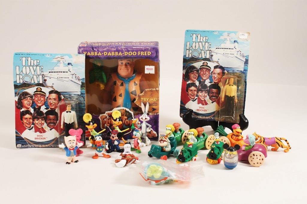 Collectible Toys and Action Figures: 1993 Fred Flinstone figure (NIB), (2) 1981 Love Boat Figurines, Disney & Warner Brothers plastic molded figurines, Hensen toys, and more 