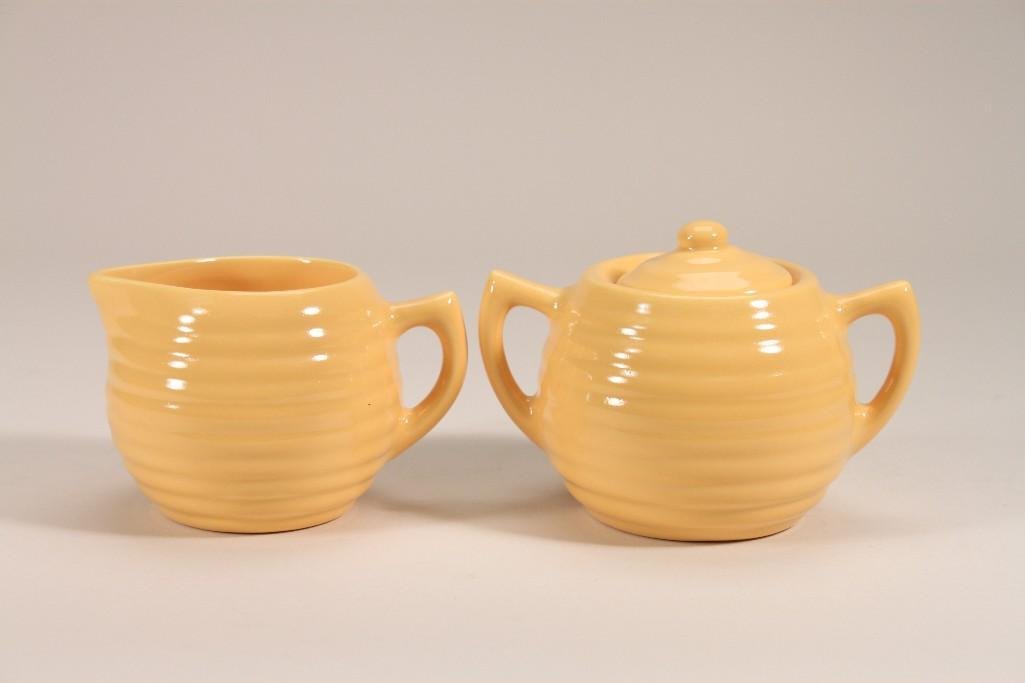 Bauer Pottery Cream and Sugar: Yellow cream is 3.3" tall, and the sugar is 4" tall, very good condition, both are marked Bauer Pottery