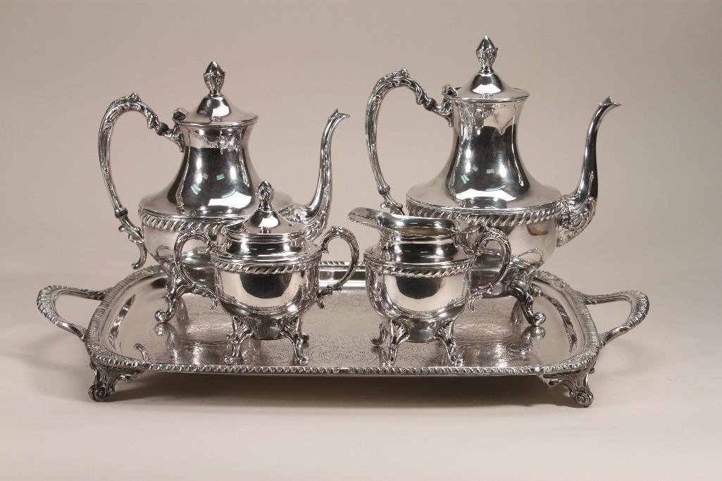 Glastoneury Silver Plate Tea Set: Marked Silver on Copper Number 503, includes coffee(marked 501) pot teapot (marked 502), cream and sugar, and tray, all are in very good condition