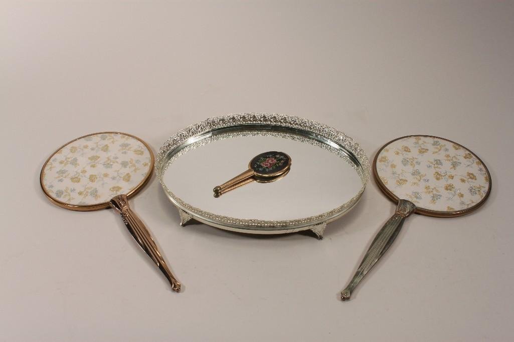Vintage Vanity Mirrors (4): (3) hand mirrors, smallest one is 5.5" long, the larger ones are 15.5", and one 12" mirrored tray, all in good condition
