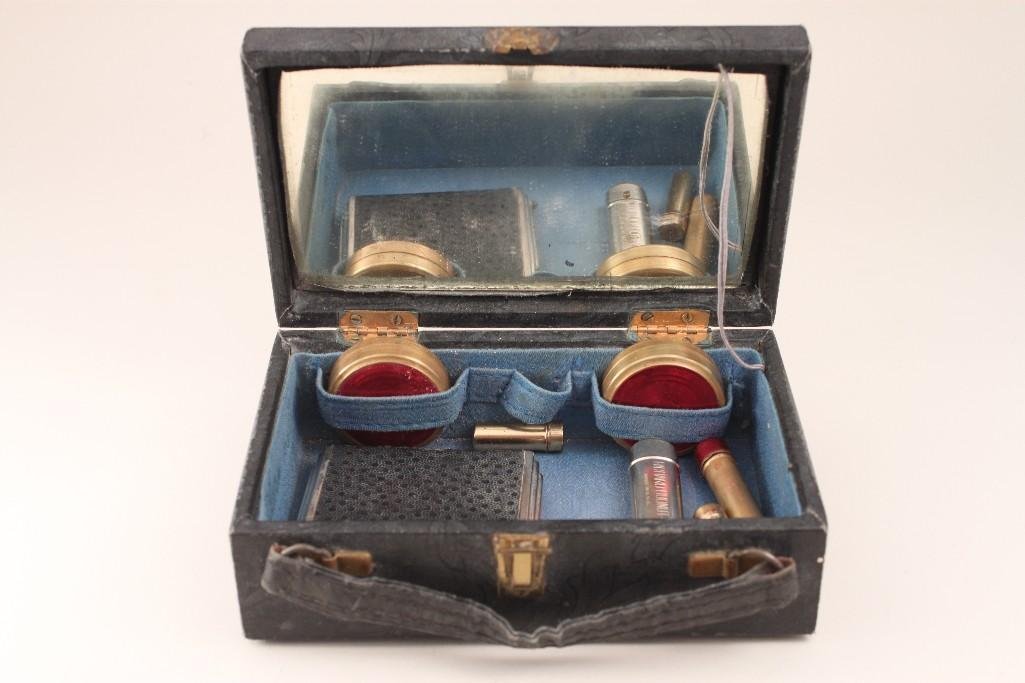Ladies Vintage Travel Makeup Case: Black box contains lipstick , compact, 2 small boxes, and 2 small lipstick samplers. 