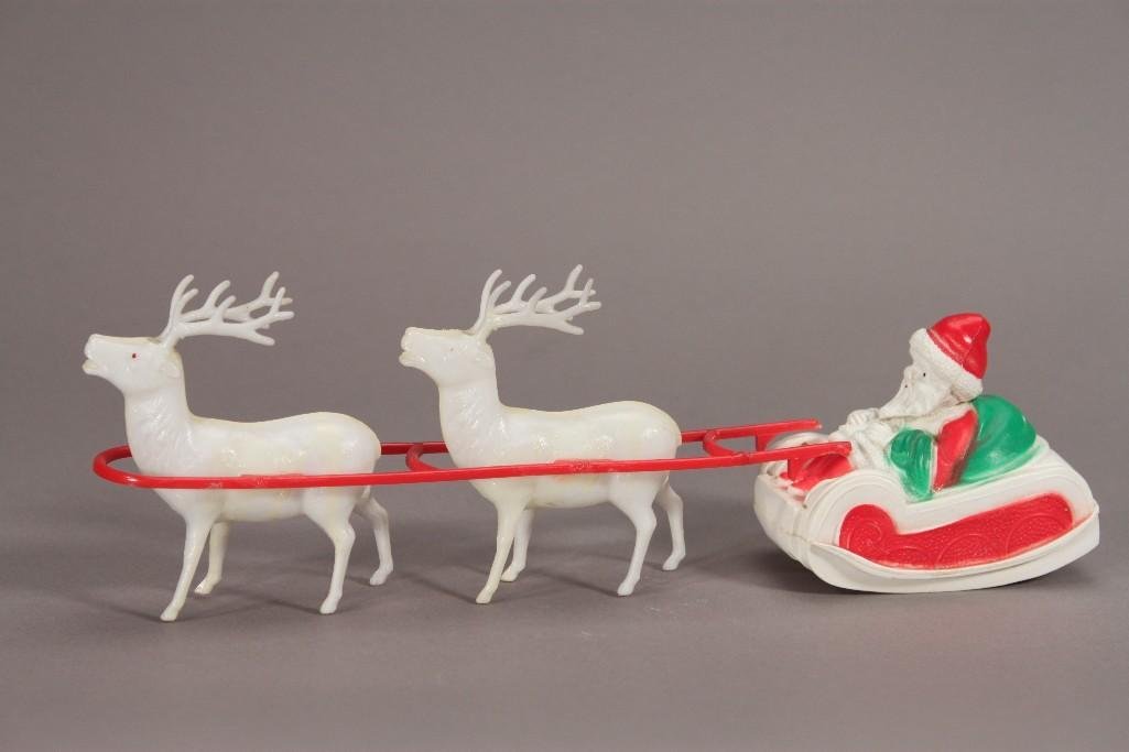 Vintage Celluloid Santa and Reindeer Toy: Two old plastic reindeer and Santa's sleigh Christmas decor. Marked non-inflam and irwin made in USA.