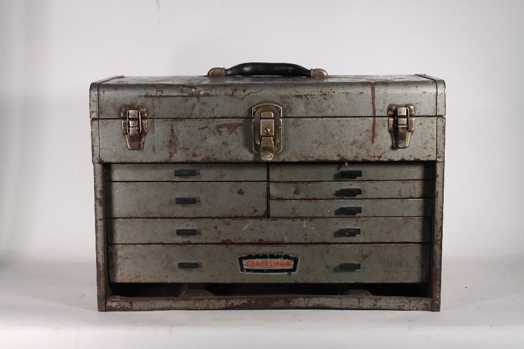 Craftsman Metal Tool Box and Contents: 4 drawer metal Craftsman tool box, contents include screwdrivers, hammers, screws, pliers, wrenches and more. Shows heavy use.