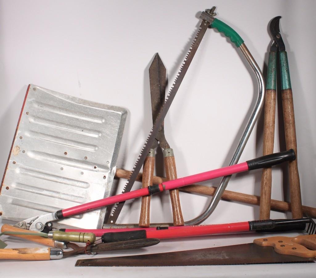 Garden Tools: Lot includes snow shovel, large pruning sheers, hand saw, hand rake, and more.