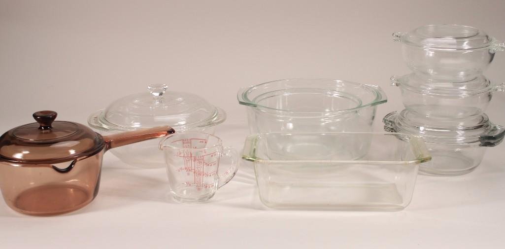 Ovenware (9): Items include: a Pyrex 9" in diameter lidded casserole dish, Anchor lidded casserole dish, a small Pyrex measuring cup, two other unmarked bowls, and more.