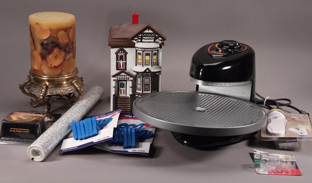 Household Decor and Appliances: Items include: Presto Pizza Oven Warmer (comes with instructions), Power Failure Guard, Gold Series Audio/Video Cable, Victorian House Cookie Jar, Large Candle on a Brass Footed Candle Holder, Contact