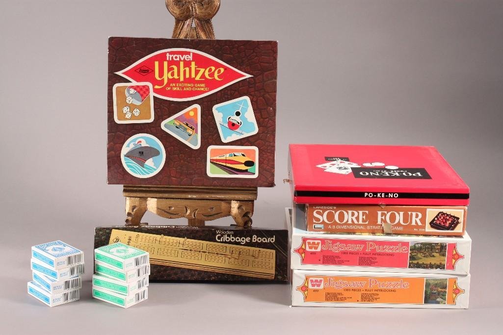 Games and Puzzles (14): items include: Jigsaw Puzzles (2), travel Yahtzee, mini playing cards, and more. Unsealed, pieces have not been counted, boxes show wear.