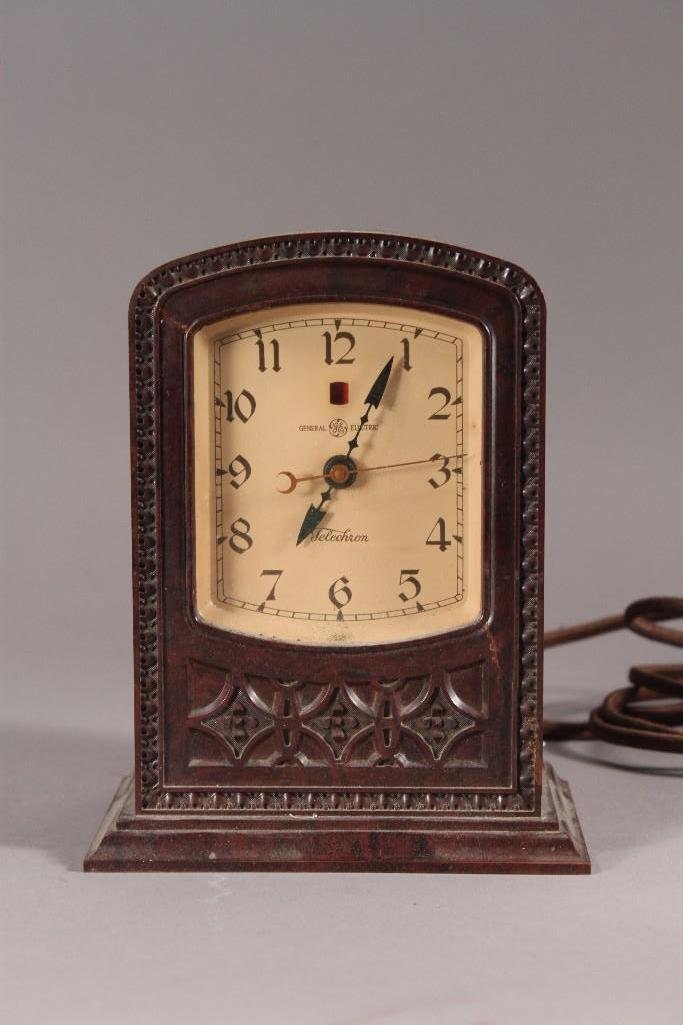 Vintage Telechron Electric Clock: Back reads motor model M1, has some cracks in the casing, 5.5" wide, 6.5" tall, 3.5" deep, needs new cord, shows wear.