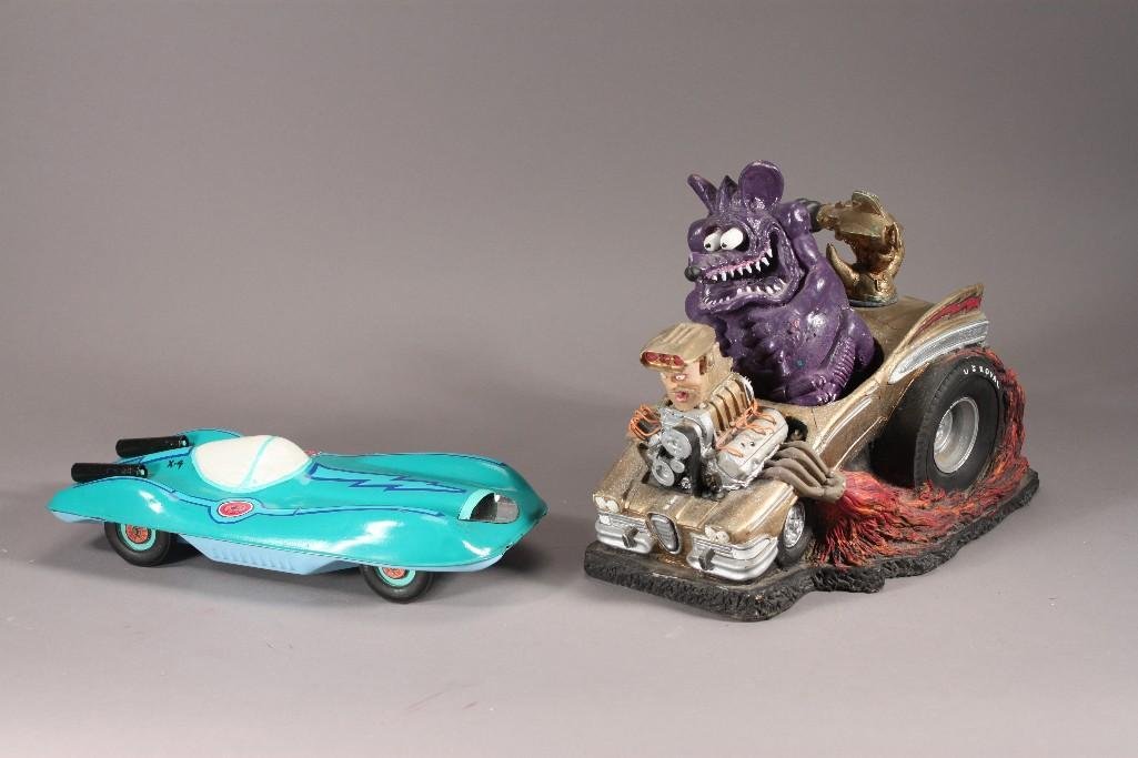 Stan "The Human Siren" Lemkuil Signed Rat Fink: Both are signed. Vintage metal car measures 12" long and has been embellished. Rat Fink sculpture measures 12" long, 9" tall, 8" deep, some wear and some chips.