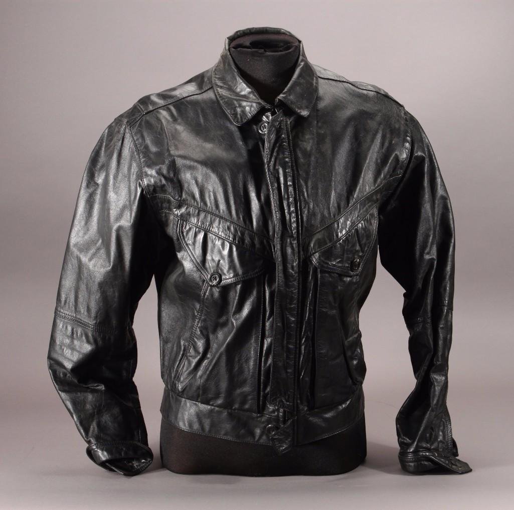 Wilson Suede and Leather Jacket: black jacket, size 40, shows age and wear. Comes from a smoking household.