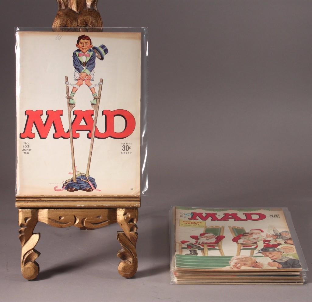 1960's Mad Magazines (9): In plastic sleeves. Issues include: " Express Santa" Jan 97 no.108, "The 100th Issue" No.100 Jan '66, "Special Racial Issue" no.111 June '67, and more.
