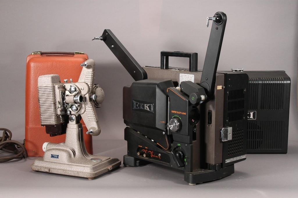 Vintage Projectors (2): One Mc Curry photo Co. Revere 85 (in carrying case), and a Eiki projector model SL-0 (in black carrying case)