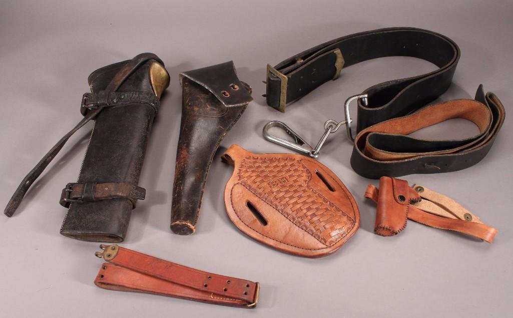 Leather Civil War Holsters, Straps and Belts (7): Items include: CW riffle holster marked ZIV, a CW revolver holster marked US and LNZ Owen and Co. Chicago, a modern shoulder holster marked BH, one modern Derringer concealed weapon holster, and 