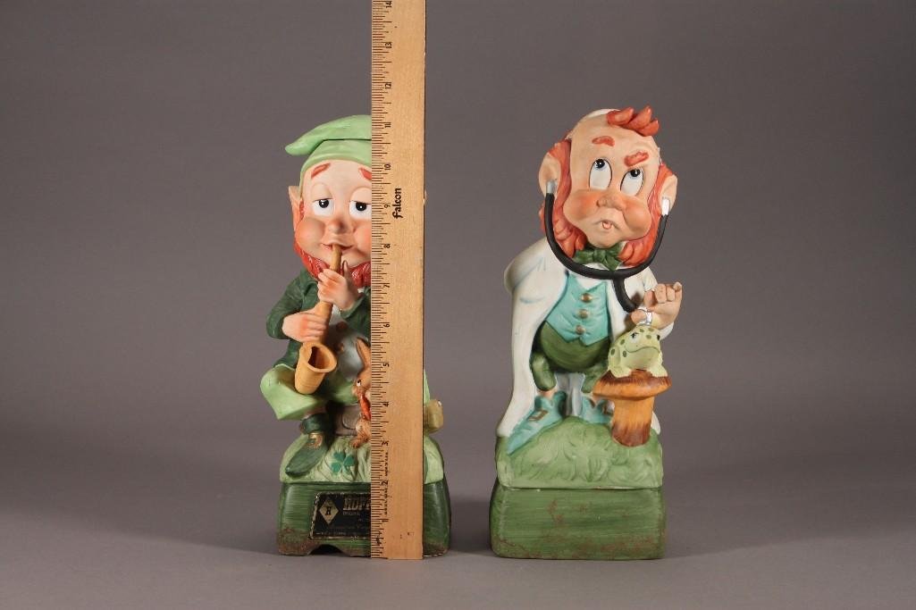 Hoffman Musical Elf Decanters (2): Doctor elf decanter measures 11.5" tall, and elf playing saxophone measures 11" tall.
