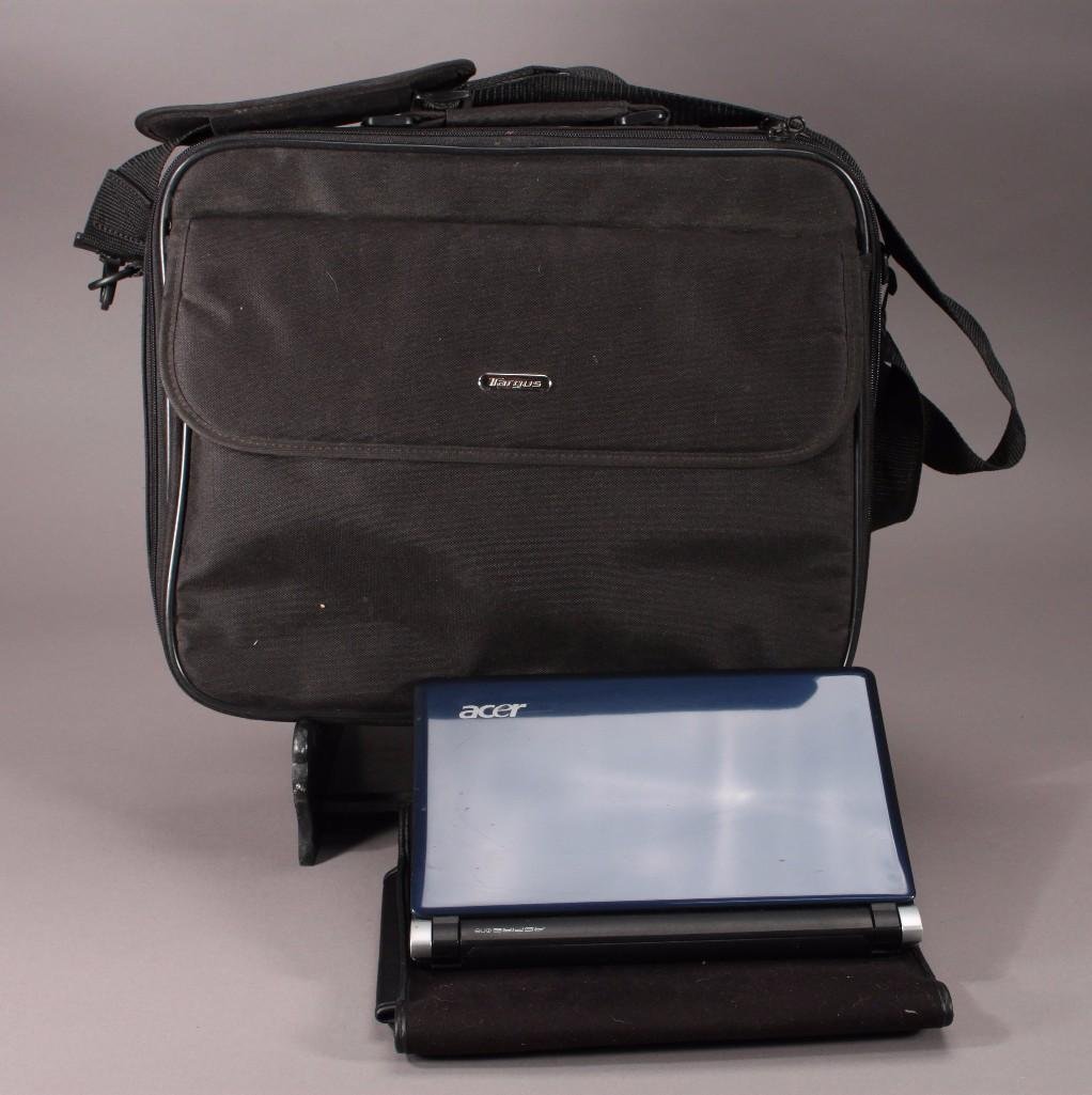Acer Aspire Ultra Thin Laptop: Model # KAV60, MFG Date 09/07, Windows XP, 10.1" LED screen, Dolby headphones, three USB ports, SD card slot, comes with sleeve, has charging cord, and laptop bag.