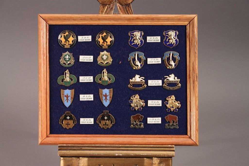 Skirmish Replica Medals (20 medals): There are two 1st through 10th cavalry medals pinned through felt and framed.