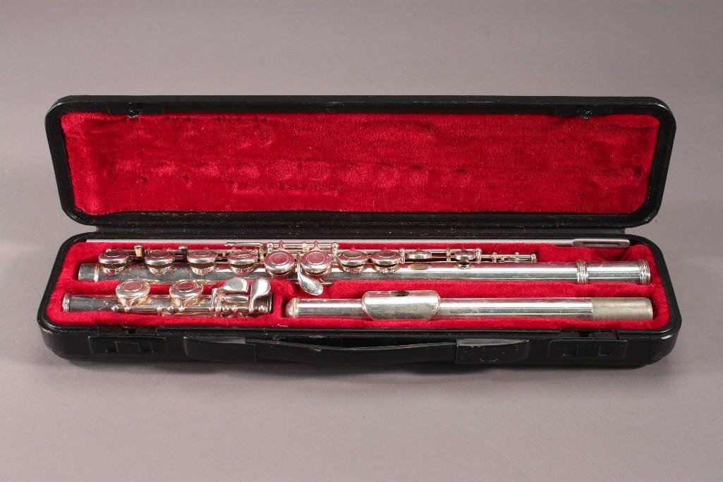 Flute with Case: All pieces are present, case is in good condition. No visible markings.