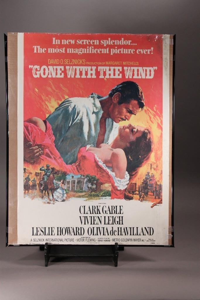 Movie Posters (2): Titles Include: 1967 Gone With The wind Poster measures 20"x28"(damage to the upper right hand corner). 1977 Close Encounters of The Third Kind measures 23"x35", has crease in bott