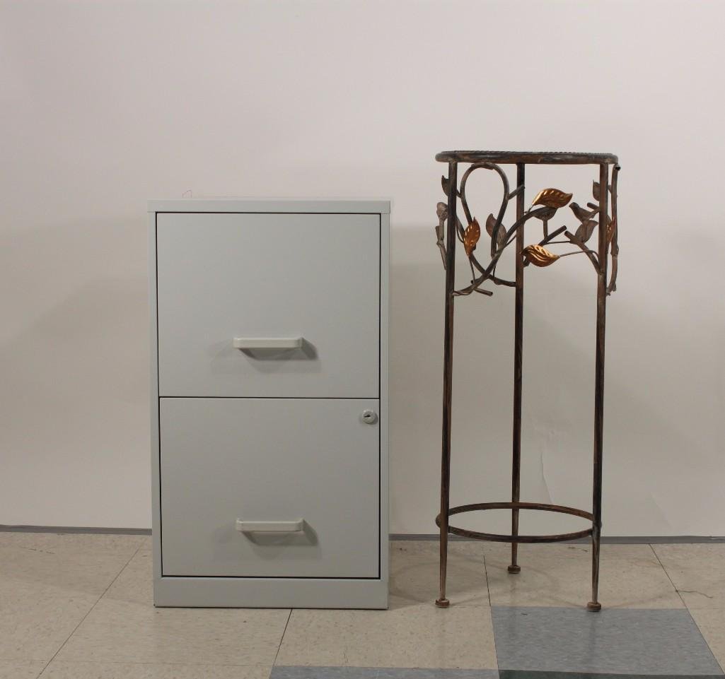 Metal Plant Stand and File Cabinet: Decorative bird themed metal plant stand 27.5" tall, 11" diameter. and a grey 14" x 24.5" x 18" metal file cabinet includes keys 