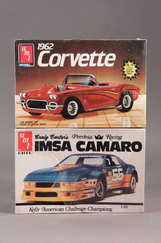 AMT Plastic Model Kits (2): Includes: 1962 Corvette, and a IMSA Camaro. Both in original packaging, plastic on the Camaro box is ripped.