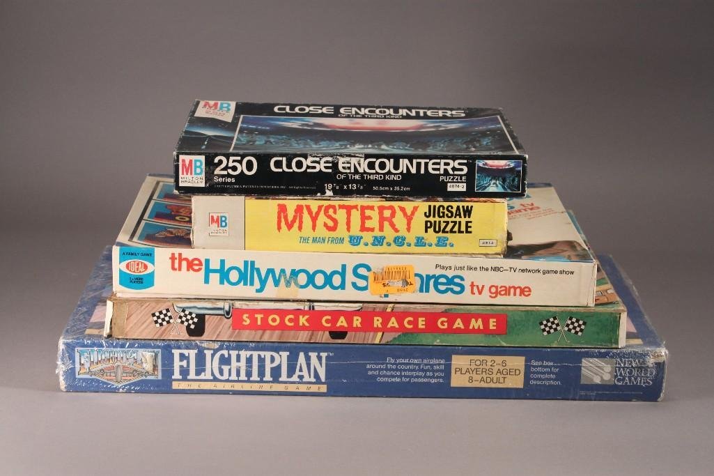 Vintage Board Games and Puzzles (5): Puzzles include Close Encounter of the third kind, Mystery jigsaw puzzle, Games include the Hollywood squares tv game, stock car race game, and Flight plan airline game