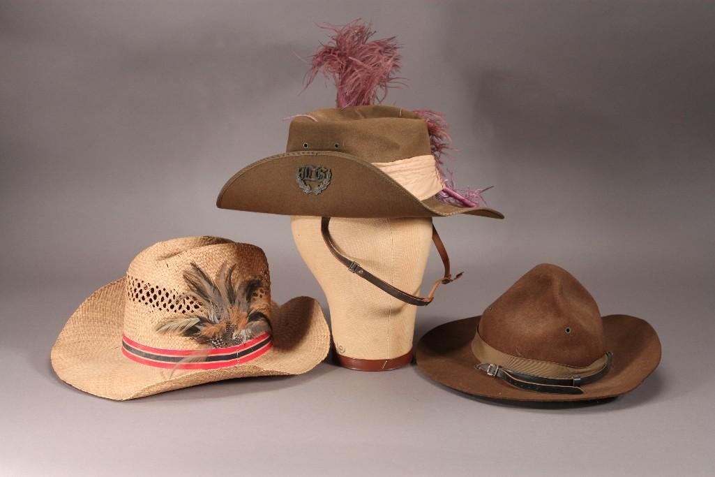 Vintage Mens Hats (3): Includes a brown felt hat marked "Hat, Service, Field", size 7 (shows age and wear), a straw cowboy hat with feathers, and a Civil War reenactment hat with purple feathers (feathers show wea