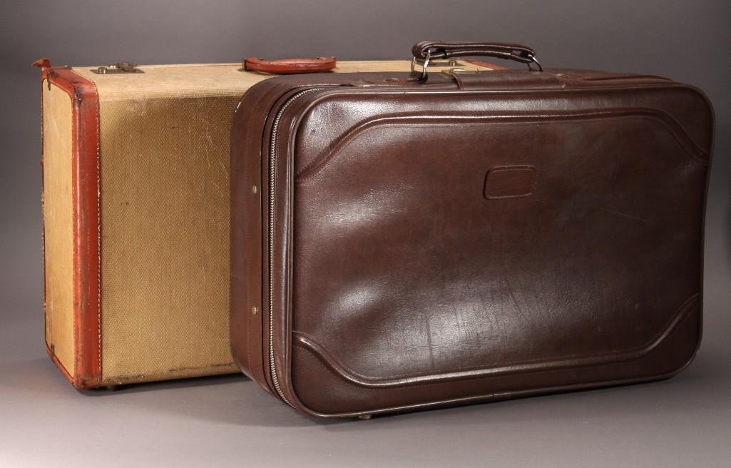 Vintage Suitcases (2): One brown vinyl suitcase (shows age and wear), one tan pin striped hard side 26" x 8 x 16" suitcase (shows age and wear)