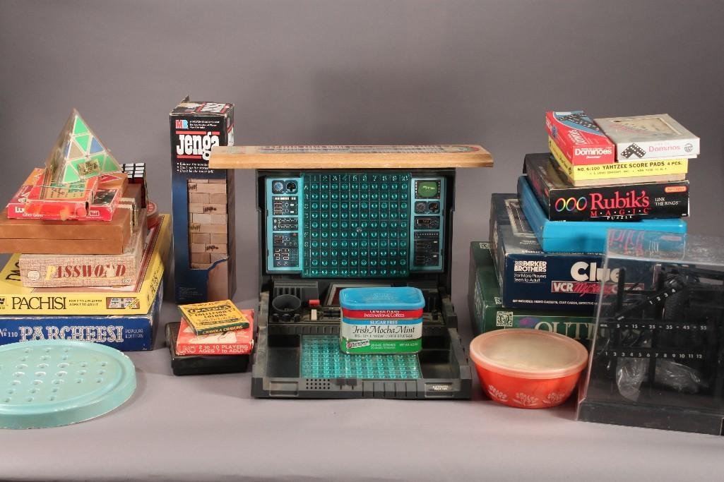 Vintage Board Games and Puzzles: Large assortment of board games and puzzles including Outburst, Janga, Rubik's magic puzzle, Yahtzee score pads, Rubik's cube, and much more 