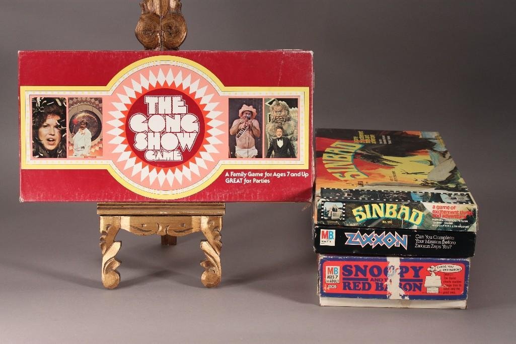 Vintage Board Games (4): Includes Snoopy and the Red Baron 1970 (some pieces may be missing), Zaxxon 1982, Sinbad 1978, and Gong Show Game 1977 (used condition)
