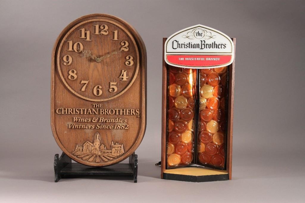 Vintage Christian Brothers Clock and Electric Sign: Brandy Bar Glorifier Electric sign shows some wear but is in working condition 18.5" tall, and a Christian Brothers wines and Brandies battery operated wall clock 19" x 11"