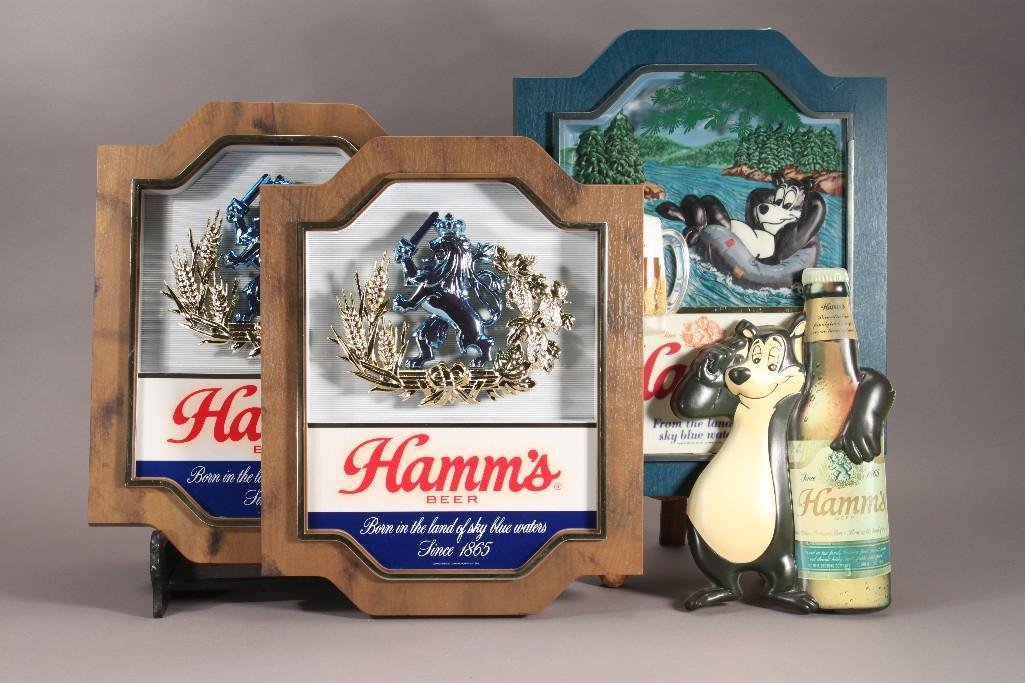 Vintage Hamm's Beer Advertisement Signs (4): Blue sign is missing cord and measures 14" X 18" (crack on back side). Two Hamm's beer lion wall signs measure 14" X 18" and one plastic Hamm's beer sign.