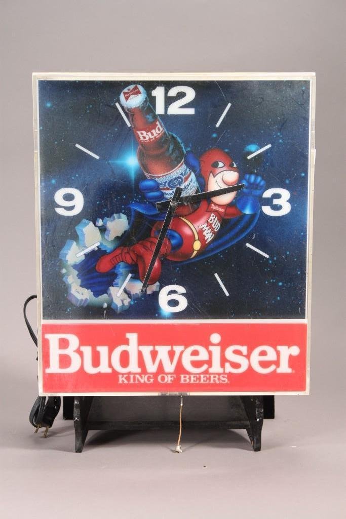 Bud Man Budweiser Clock: 13.5" x 16" x 4.5", in working condition, shows some age and wear 