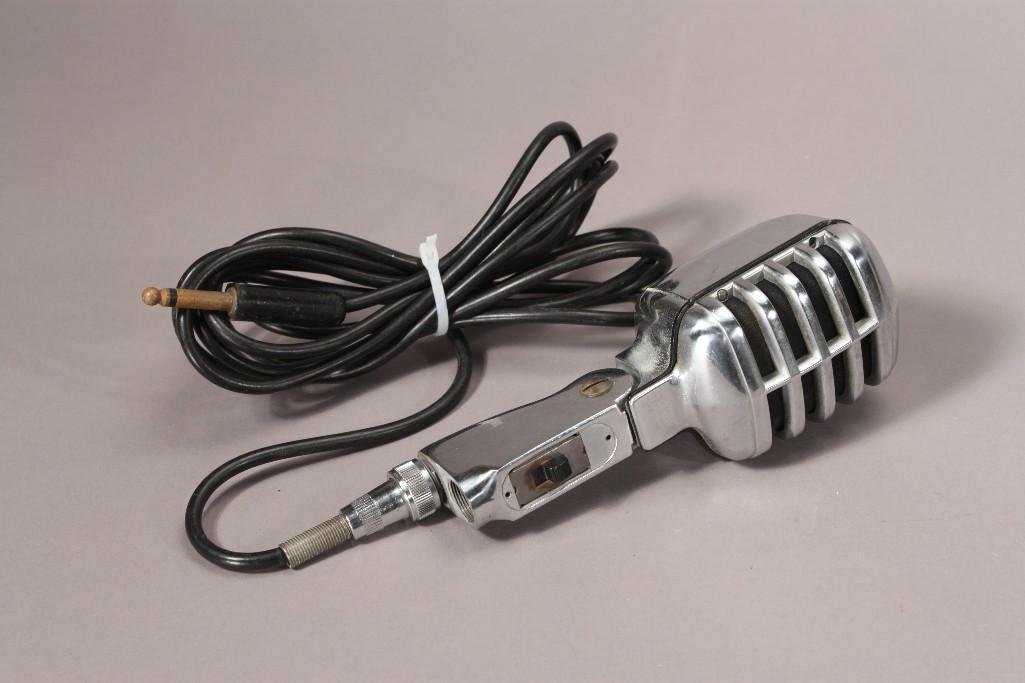 Vintage Microphone: Hand held corded metal microphone measures 8" tall, 2.5" wide. Looks to be in good condition, has not been tested.