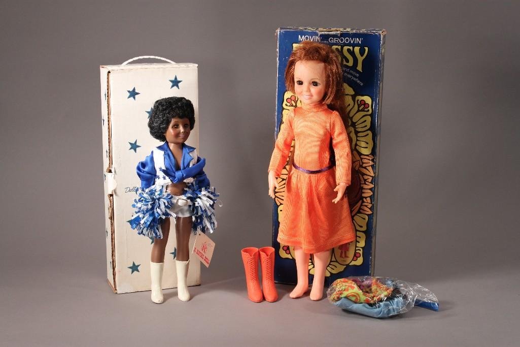 Vintage Collectible Dolls (2): Includes Dallas Cowboys Cheerleader made by Royal House of Dolls, 1982, measures 14.5" tall, plastic, in good condition, in original box and Ideal 1971 Movin'...Groovin' Crissy doll, measures 18&
