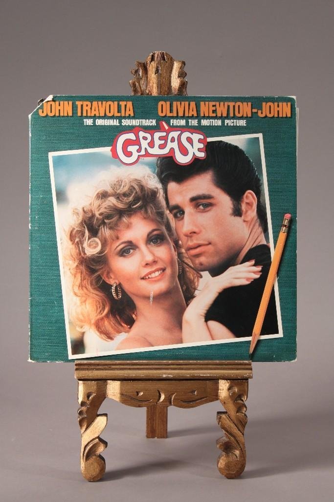 Grease Soundtrack Vinyl LP Record: Dated 1978, includes two records in fold out collectible album cover. Left corner has been cut off of cover.
