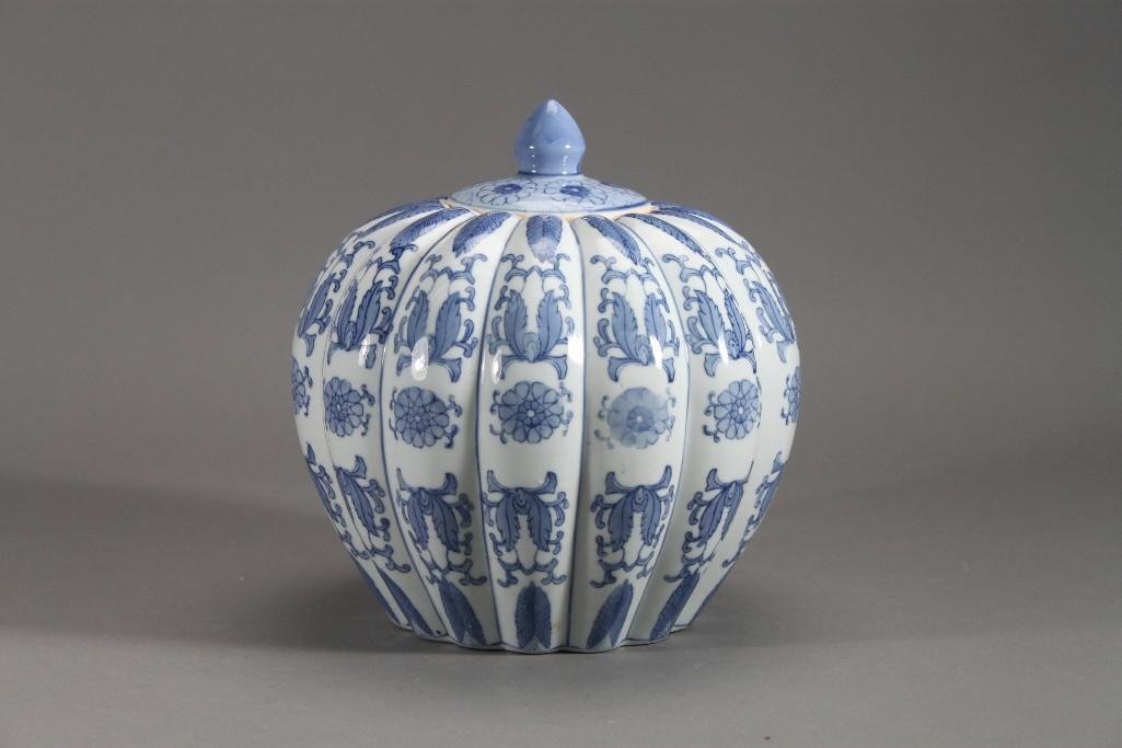 Blue and White Ginger Jar: Lidded ginger jar is unmarked and measures 10" tall and has a 10" diameter, good condition