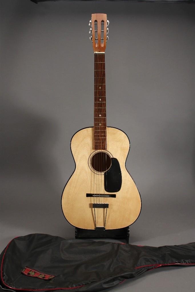 Acoustic Guitar with Soft Case: Sticker on the reads made in Taiwan Republic of China, good condition, soft case has some rips
