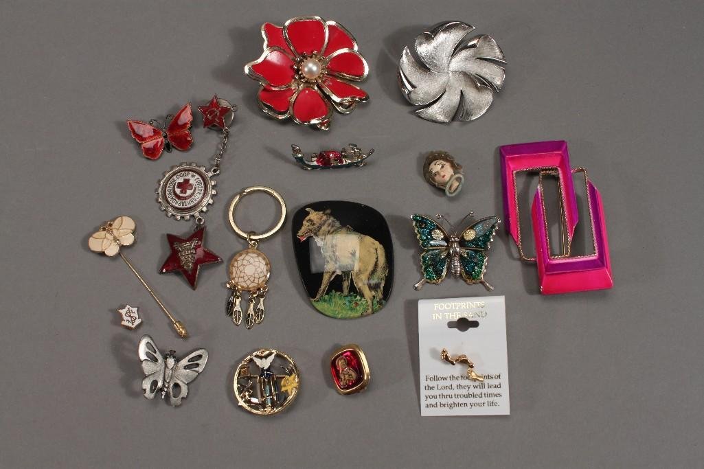 Pins and Brooches (16): Brooches: flower, butterfly, dog, and others. Pins: foot prints in the sand, butterfly, gondola, and more. Also includes dream catcher key chain. 